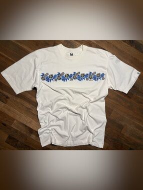 Y2K Speedo White Short-Sleeve Tee with Blue and Gold Floral Stripe